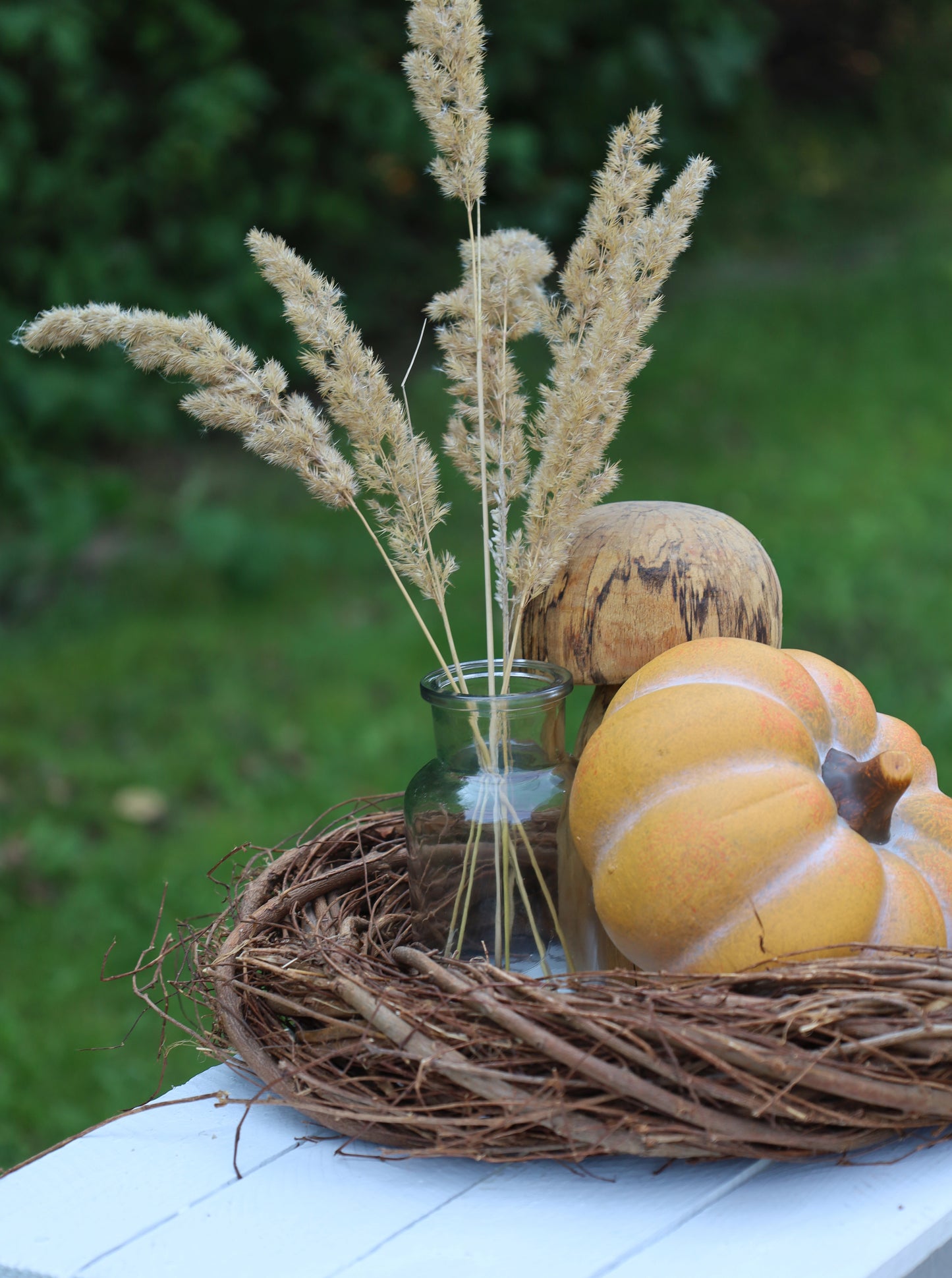 Decorazione di zucca per l'autunno realizzata in ceramica di colore arancione