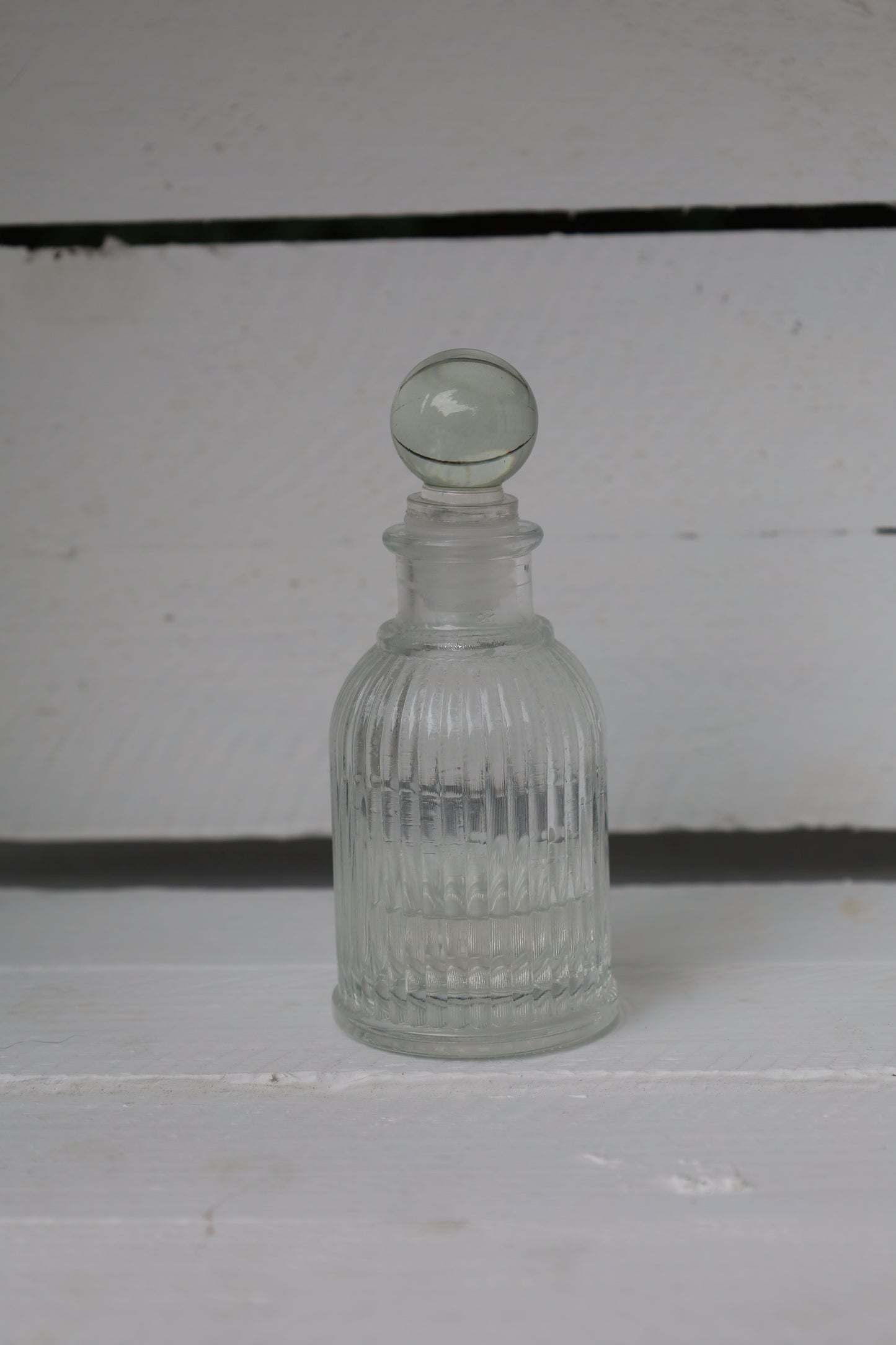 Bottle: Decorative small bottle made of glass