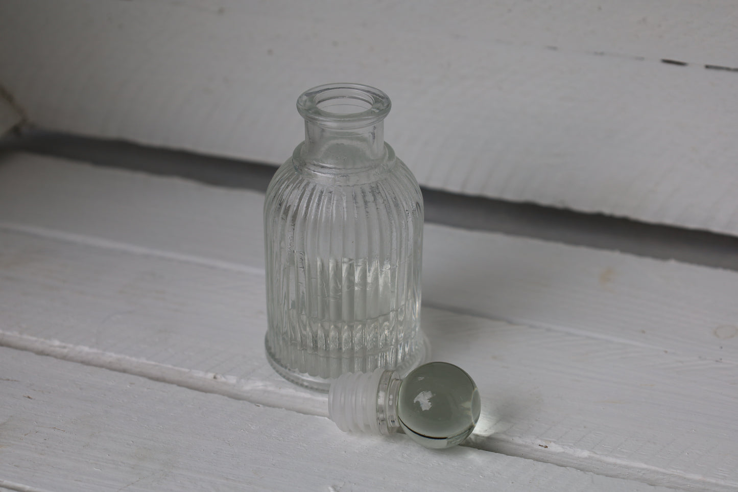 Bottle: Decorative small bottle made of glass