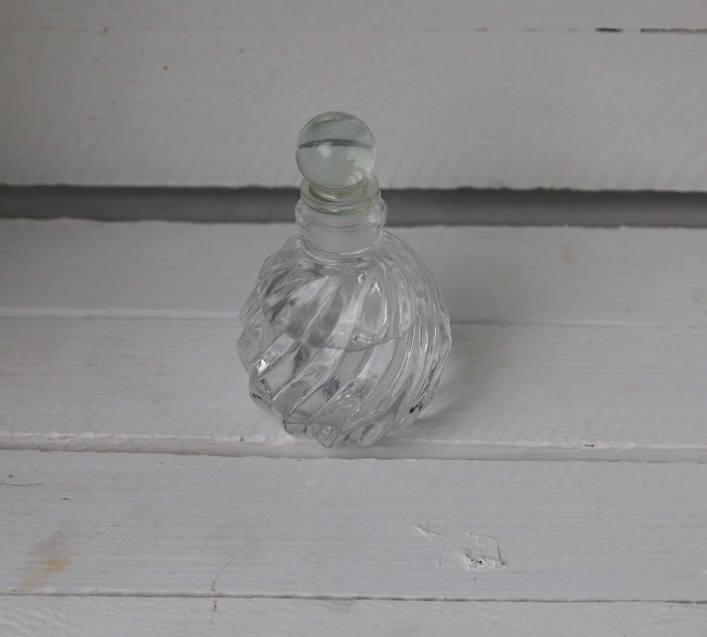 Bottle: Decorative small bottle made of glass