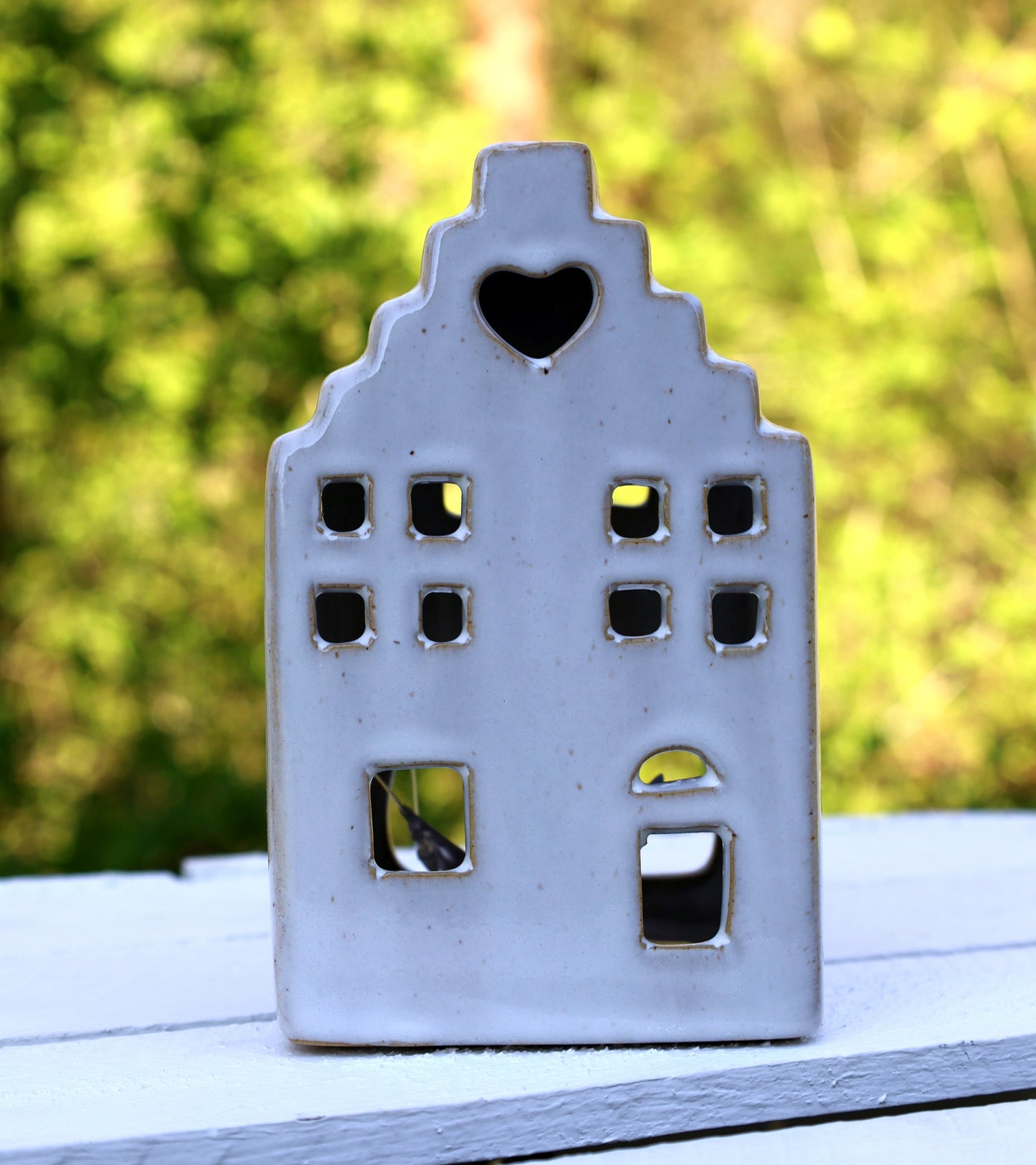Portacandele in ceramica a forma di casa