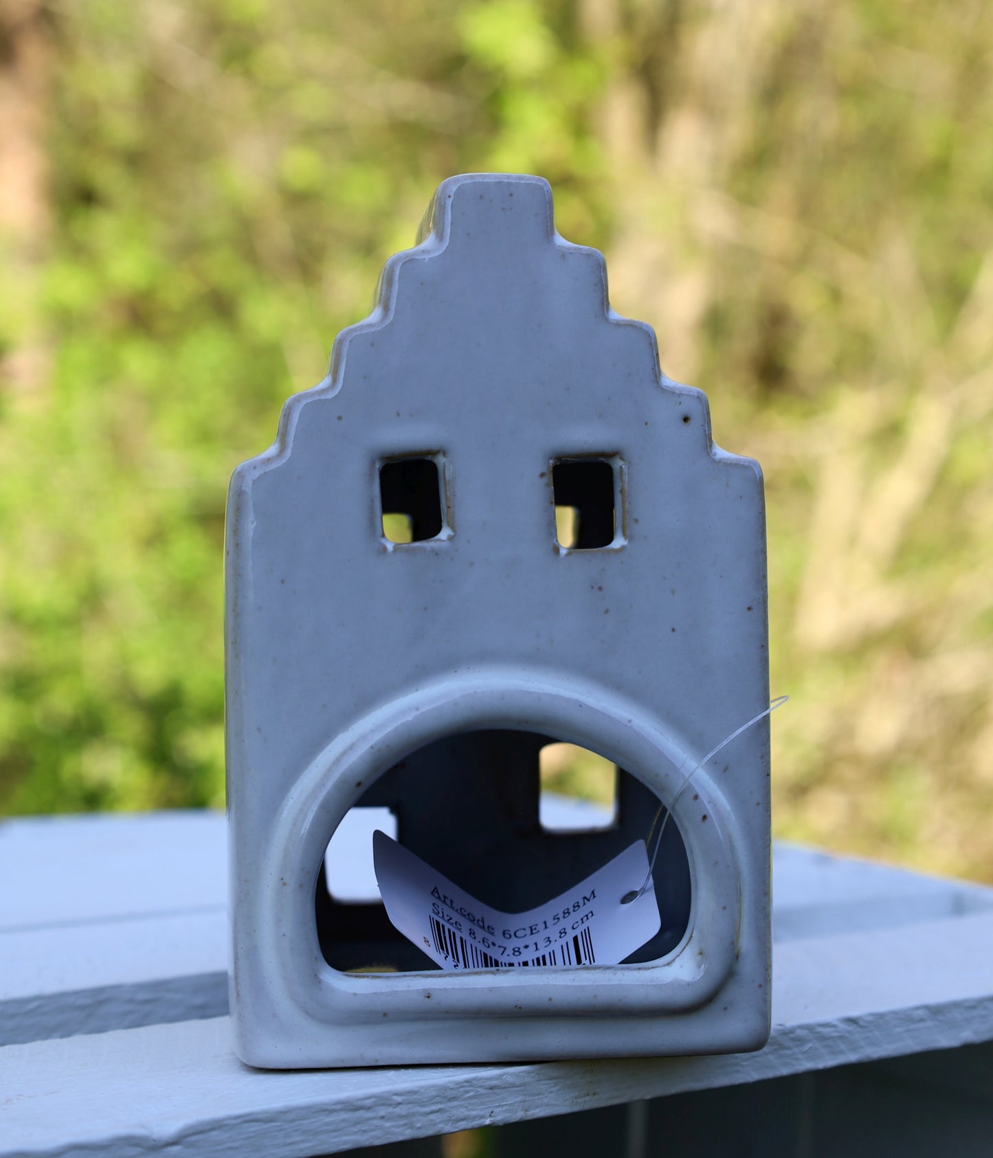 Portacandele in ceramica a forma di casa