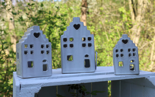 Portacandele in ceramica a forma di casa