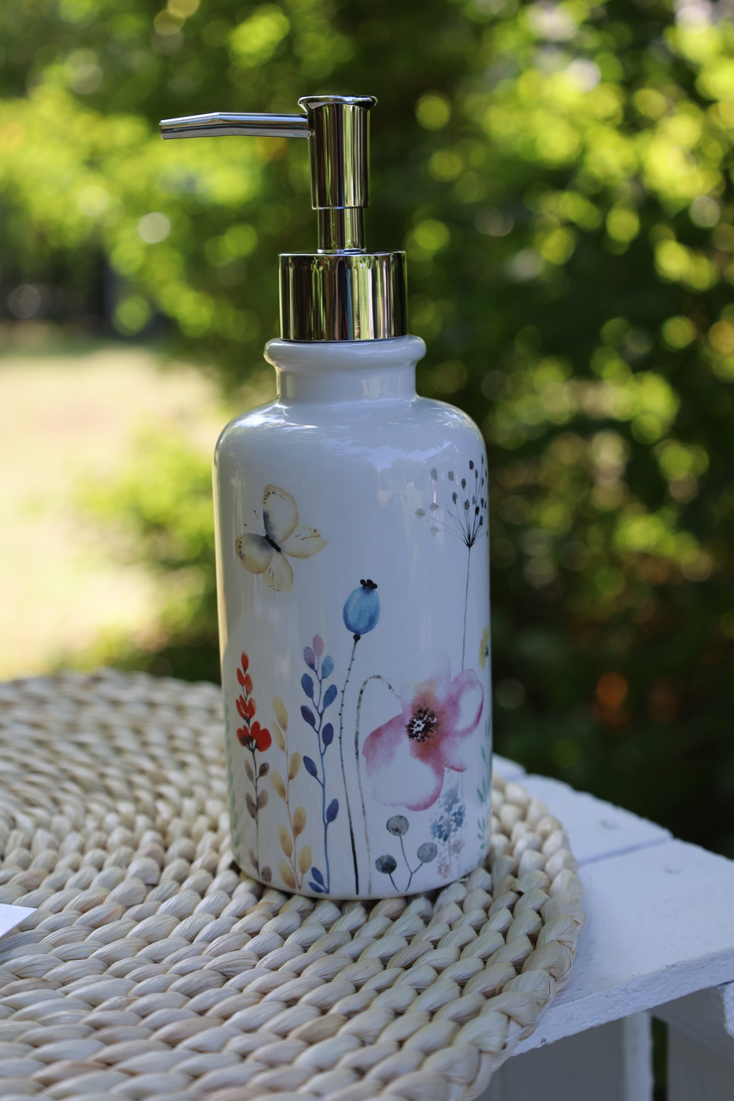 Dispenser di sapone con motivo floreale in ceramica