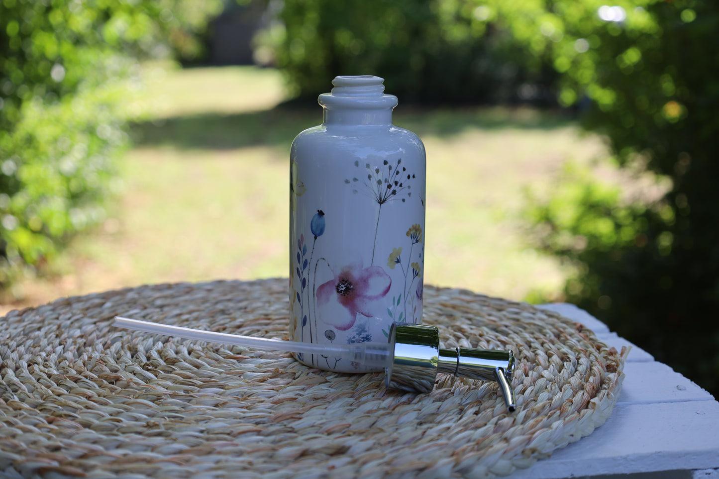 Dispenser di sapone con motivo floreale in ceramica