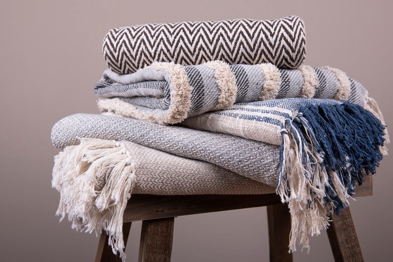 Plaid/coperta in 100% cotone nei colori blu e bianco