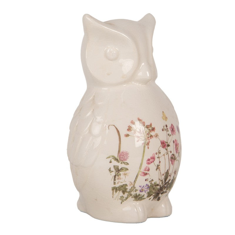 Simpatico gufo in ceramica beige con motivo di prato primaverile 