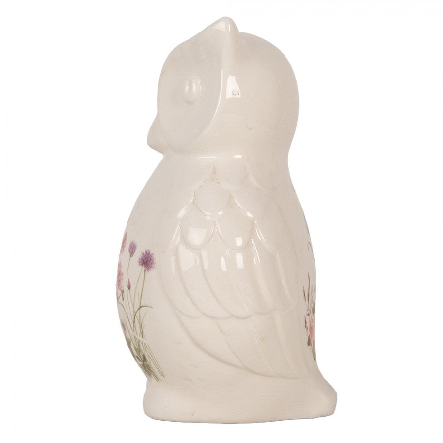 Simpatico gufo in ceramica beige con motivo di prato primaverile 